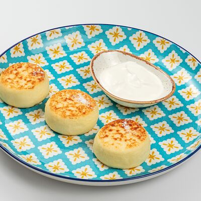 Сырники ванильные со сметаной в Maroon по цене 790 ₽