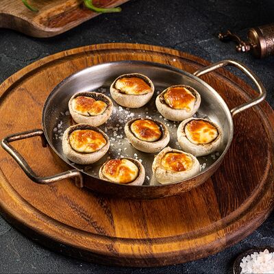 Шампиньоны с запеченным сыром в Таксиммайдан по цене 930 ₽