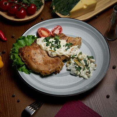 Курица (филе) по-госконски в The Кухня по цене 530 ₽