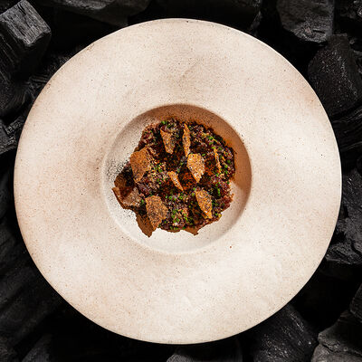 Тартар из олениныв Dodici Grill по цене 1630 ₽