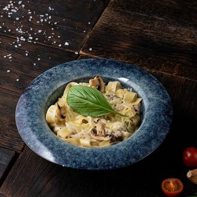 Паста с шампиньонами в Мангал по цене 350 ₽