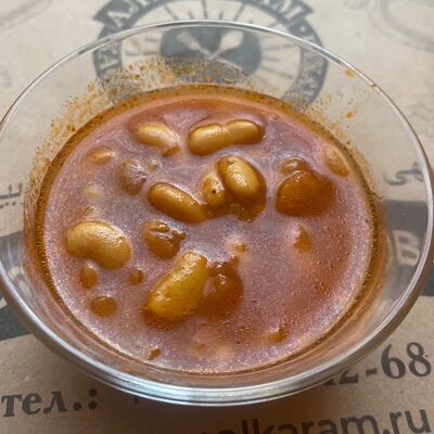 Белая фасоль в томатном соусе в Кафе Аль-карамарабская кухня по цене 180 ₽