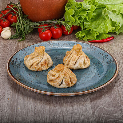 Хинкали со свининой и говядиной жареные 3 шт в Грузинский дворик по цене 400 ₽