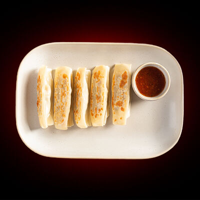 Жареные Го-Те со свининой в Китайские Новости по цене 610 ₽