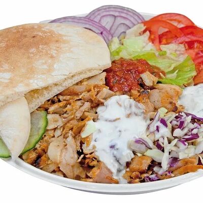 Шаурма на тарелке свинаяв Мангал36 по цене 460 ₽