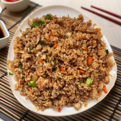 Рис жареный со свининой в Wai Mai по цене 450 ₽