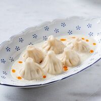 Мини-хинкали с сыром таледжио и соусом из грибов в PaDRE KHINKALI