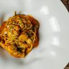 Спагетти с гребешком, креветками, кальмаром в соусе биск в FARRO PASTA BAR по цене 920