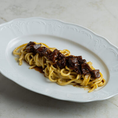 Паста Качо э Пепе с говяжьими щечками в Nomad по цене 1190 ₽