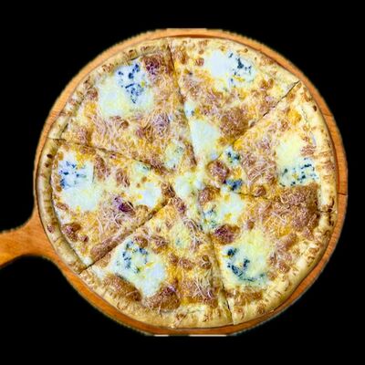 Пицца Четыре сыра на традиционном тесте в Леон по цене 700 ₽