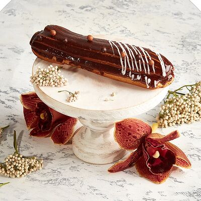 Эклер с кофейным кремом в Кондитерская СантОноре по цене 176 ₽