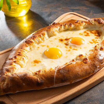 Хачапури по-аджарски, лодочкав Форель по цене 700 ₽