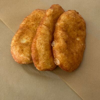 Пирожок с картофелем жареный в Пирожковая по цене 100 ₽