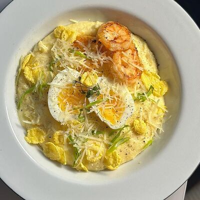 Полента с тигровыми креветками в Camon Cafe по цене 930 ₽