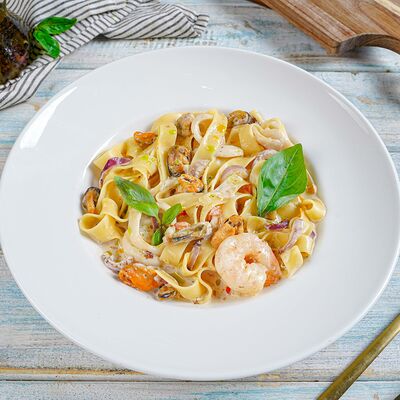 Паста с морепродуктами в Термос по цене 990 ₽