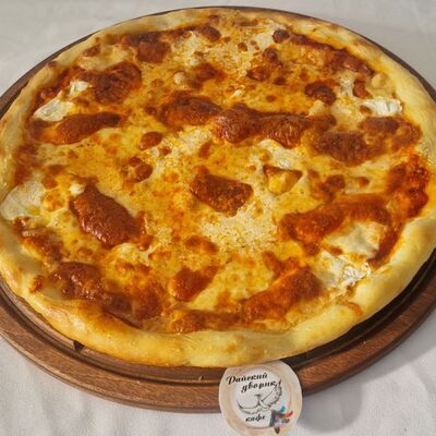 Пицца 4 сырав Райский дворик по цене 550 ₽