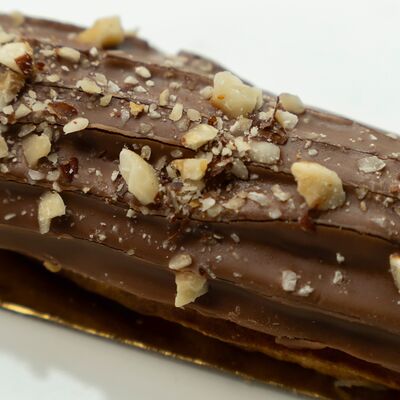 Эклер ванильный в Романовская пекарня по цене 300 ₽