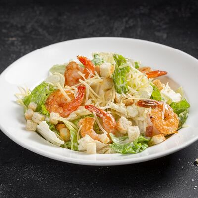 Салат Цезарь с креветками в T.G.I. Friday's по цене 539