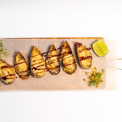 Запечённые мидии в Harats pub по цене 990 ₽