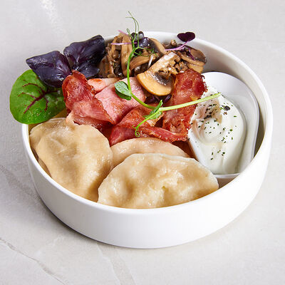 Вареники с картофелем, шампиньонами и жареным беконом в Sugar Mama по цене 520 ₽