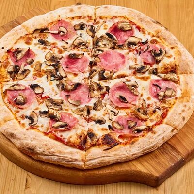 Пицца с ветчиной и грибами в 4 сыра по цене 810 ₽