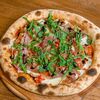 Пицца с прошутто, страчателлой и клубникой в VINO e CUCINA по цене 1190