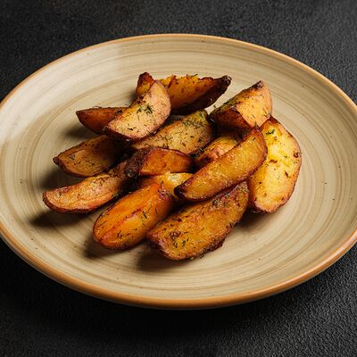 Картофель запеченный в Де'рибас по цене 420 ₽