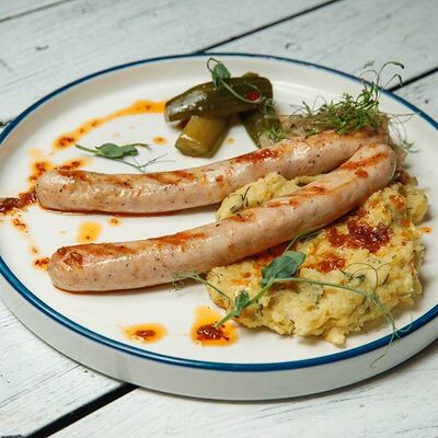 Сосиски куриные с шукрутом в Овертайм по цене 620 ₽