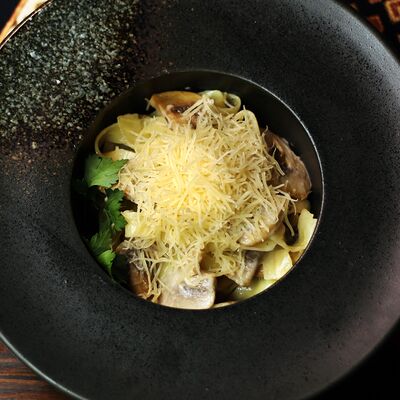 Паста с грибами в Золотой Кувшин по цене 450 ₽