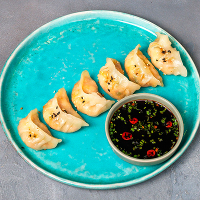 Китайские пельмени с креветками и лососем в Чайхана Баранжар по цене 625 ₽
