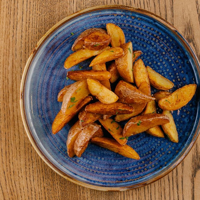 Картофельные дольки в Кубанские пивоварни по цене 270 ₽