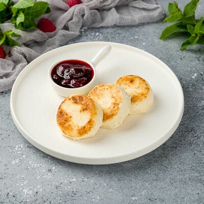 Сырники с клюквеным соусом в Магбургер по цене 99 ₽