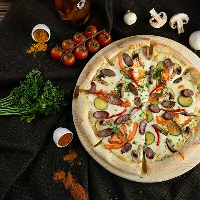 Пицца Охотничья (32 см) в Pizza Milano по цене 890 ₽