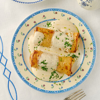 Блины с сыром, картофелем и сырным соусом в Сыроварня по цене 750 ₽