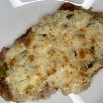 Свинина под соусом тартар в Пузата хата по цене 179 ₽