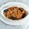 Spaghetti al cartoccio, запеченные в пергаменте с морепродуктами в Mozza по цене 1450