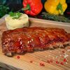 Свиные ребра BBQ с картофельным пюре и луком фри в Пивная №1 по цене 785