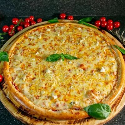 Пицца четыре сыра в Pizza-grand по цене 650 ₽