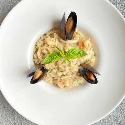Ризотто с морепродуктами в Максима Пицца по цене 1300 ₽