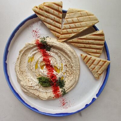 Хумус с питойв Фришман по цене 270 ₽