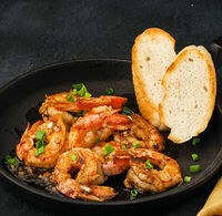 Лангустины жареные с чесночным маслом в Mojo