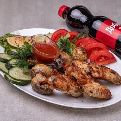 Комбо №1 Куриные крылышки и Добрый Кола в МангалХаус по цене 799 ₽