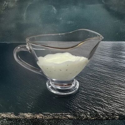 Чесночный фирменный соус в Пито-Грильто по цене 50 ₽