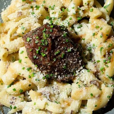 Ригатони с томленой говядинойв Gino Cafe по цене 1100 ₽