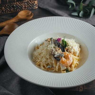 Паста лингвини с морепродуктами в Amato по цене 1040 ₽