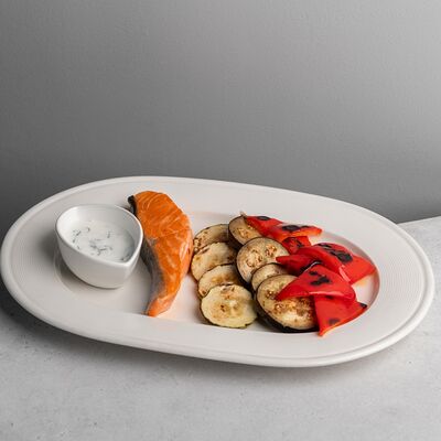 Стейк из кижуча с овощами гриль и соусом дзадзыки в Великие по цене 1560 ₽