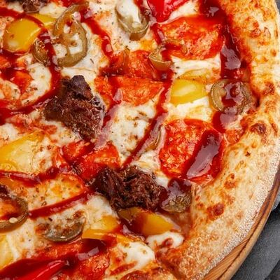 Пицца Дьябло с перчиками халапеньо в Наше место по цене 660 ₽