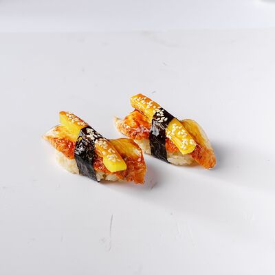 Нигири с угрем и такуаном в Филадельфия по цене 384 ₽