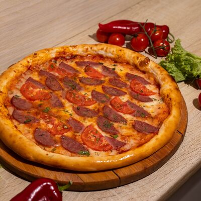 Пицца Салями в Плюшка ватрушка по цене 650 ₽