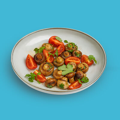 Жареные шампиньоны с чесноком и кинзой в Додома по цене 525 ₽